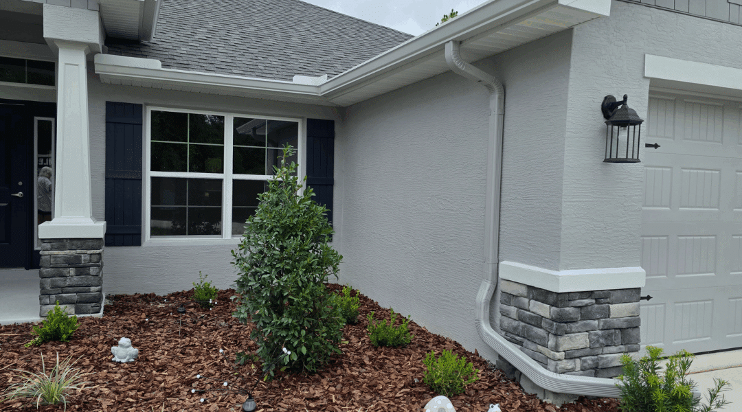 White Gutters and Gray Downspouts Installation in Brooksville, FL